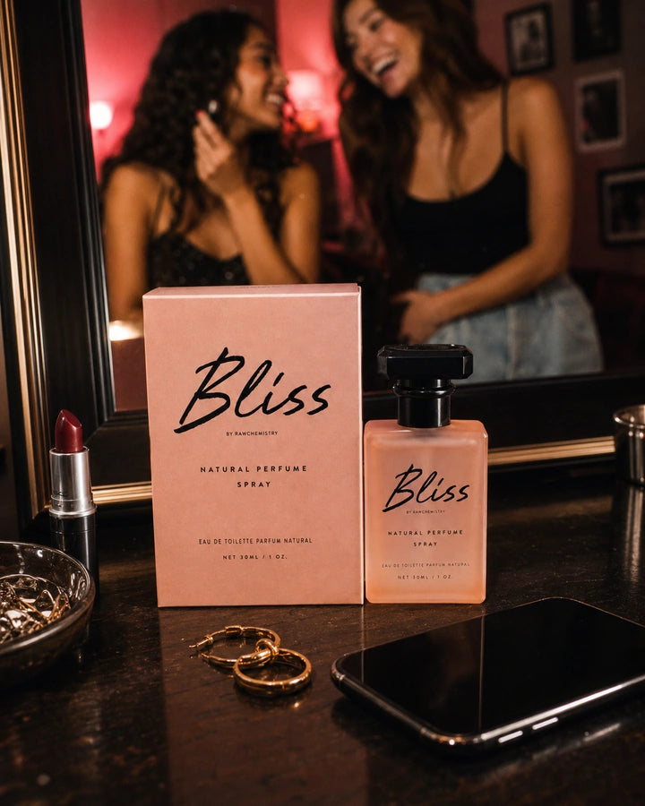 Bliss perfume and carton on a playful getting-ready vanity