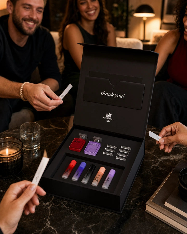 Open RAW Chemistry Discovery Collection box with two miniature fragrances, five roll-ons, and seven sample vials