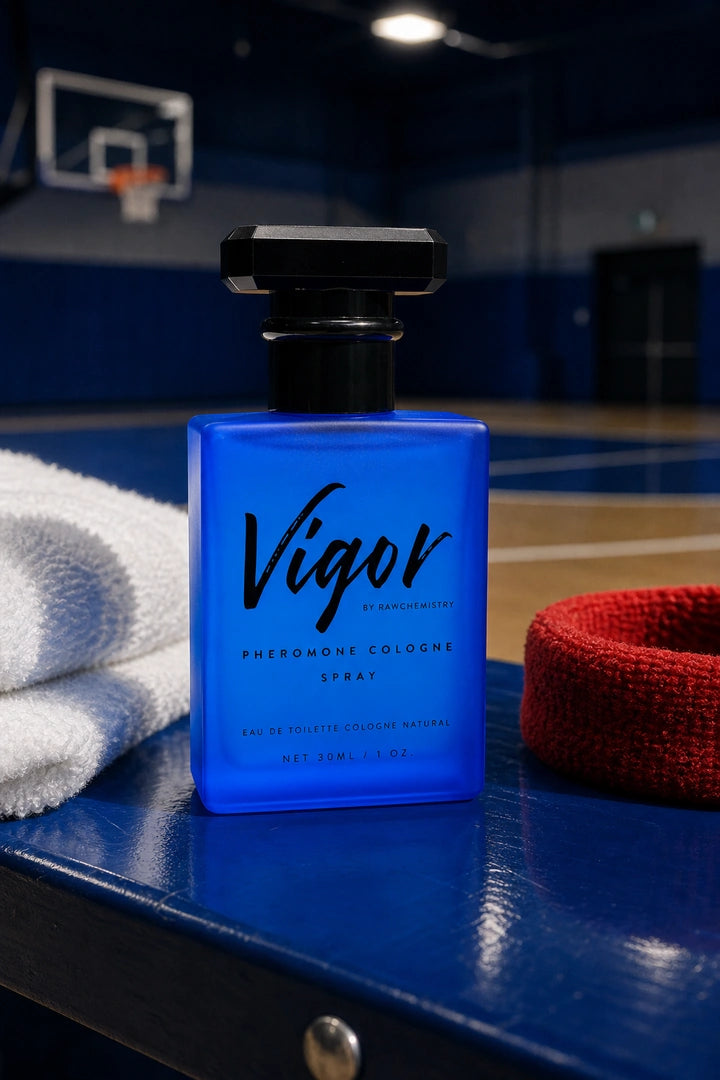 Vigor cologne and carton beside a denim jacket and headphones