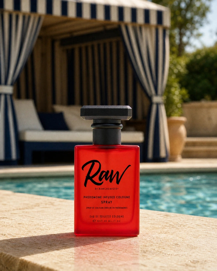 RAW pheromone-infused cologne photographed beside a Mediterranean private-club pool
