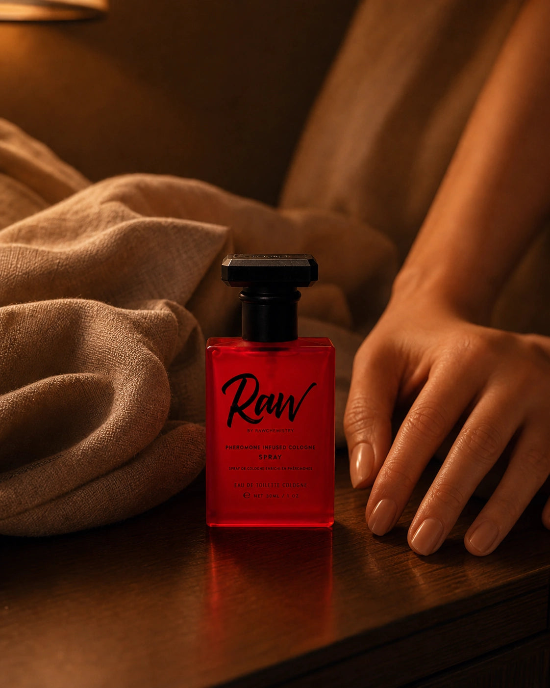 Raw cologne beside a woman in a warm evening setting
